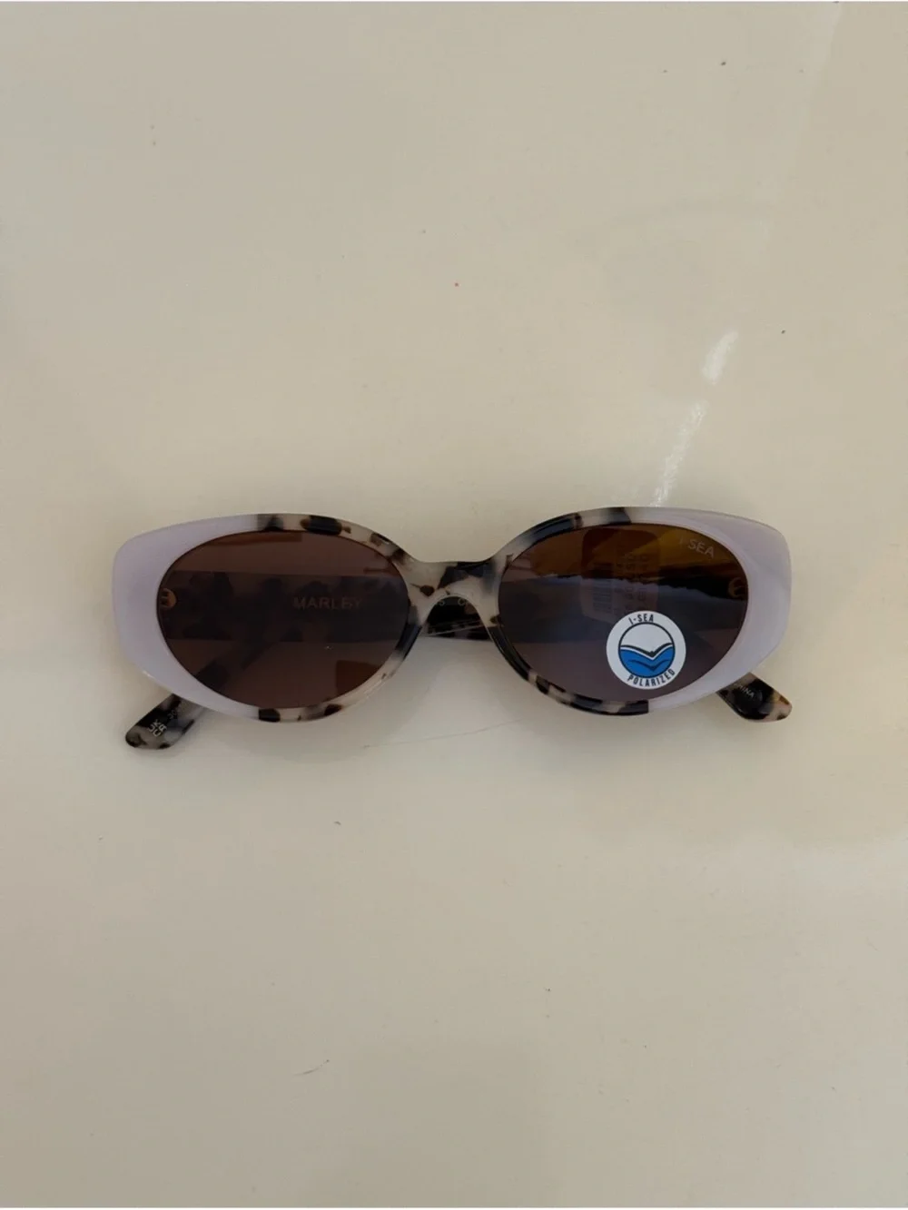 Anthropologie Tortoiseshell and White Oval Sunglasses - Brown Lenses